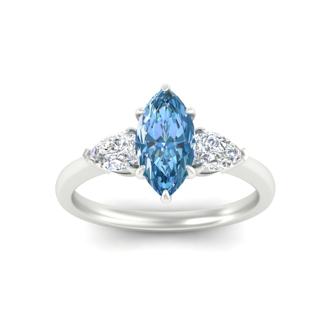 3-stone-vivid-blue-marquise-cut-cathedral-ring-in-white-gold-fdenr9210mqgvblueangle5-nl-wg.jpg
