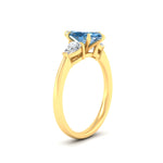 Load image into Gallery viewer, 3-stone-vivid-blue-marquise-cut-cathedral-ring-in-yellow-gold-fdenr9210mqgvblueangle2-nl-yg.jpg