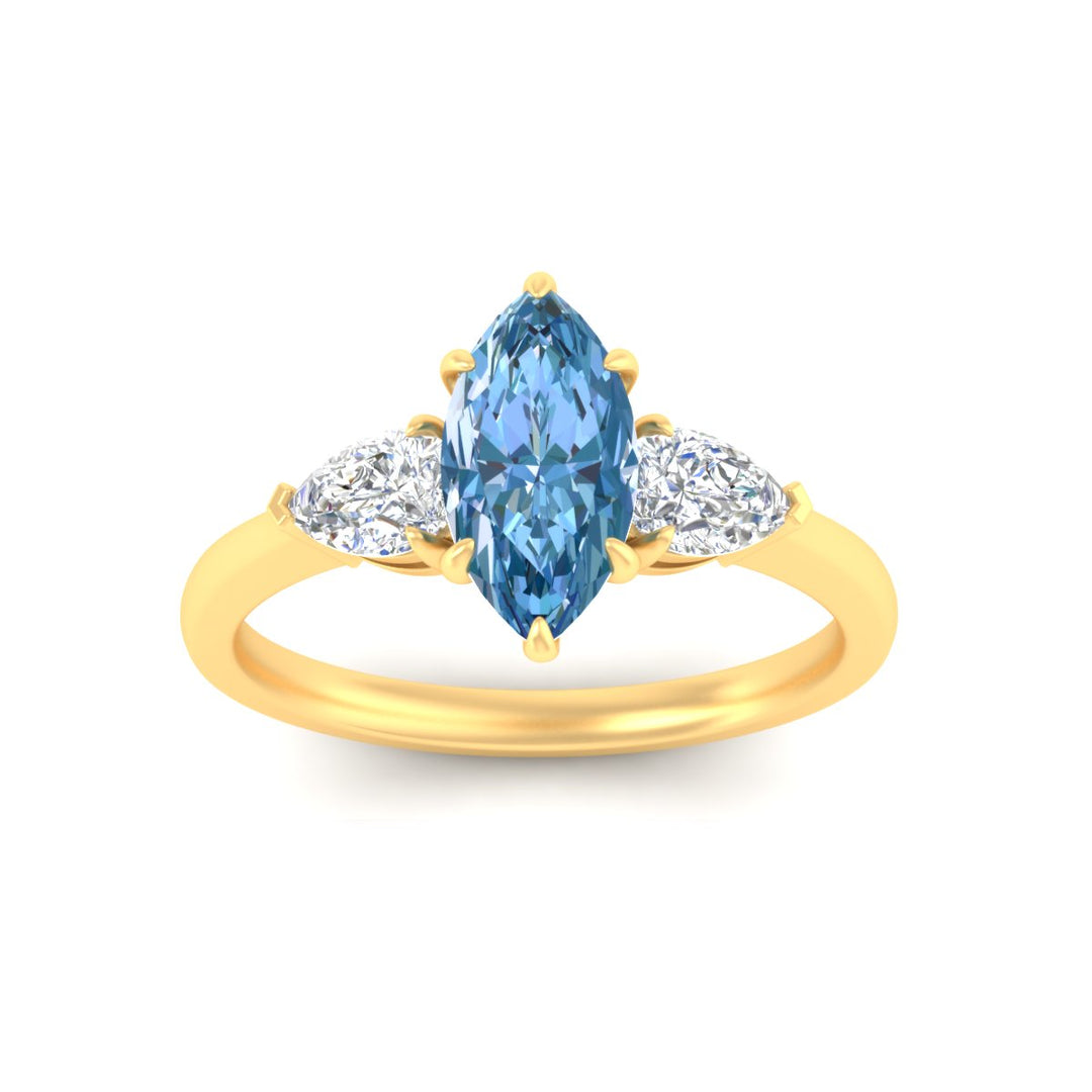3-stone-vivid-blue-marquise-cut-cathedral-ring-in-yellow-gold-fdenr9210mqgvblueangle5-nl-yg.jpg