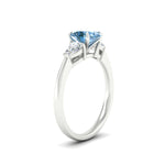 Load image into Gallery viewer, 3-stone-vivid-blue-oval-shaped-cathedral-ring-in-white-gold-fdenr9210ovgvblueangle2-nl-wg.jpg