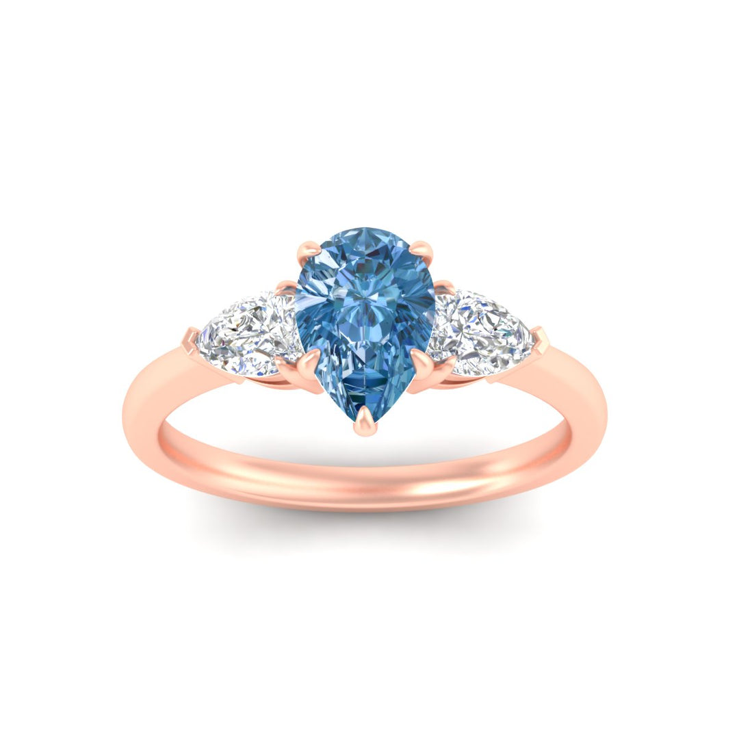 3-stone-vivid-blue-pear-shaped-cathedral-ring-in-rose-gold-fdenr9210pegvblueangle5-nl-rg.jpg