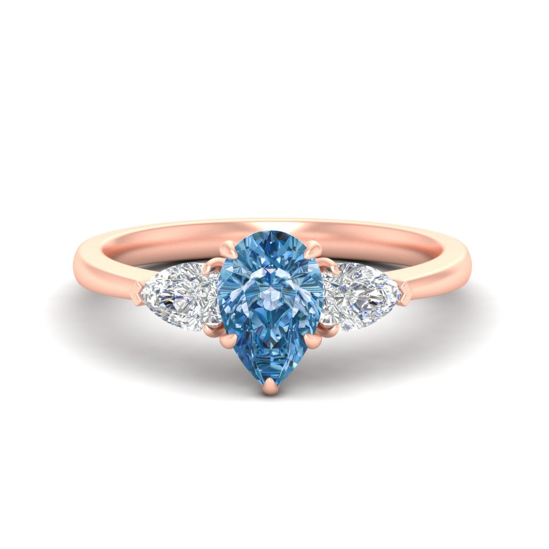 3-stone-vivid-blue-pear-shaped-cathedral-ring-in-rose-gold-fdenr9210pegvbluesleep-nl-rg.jpg