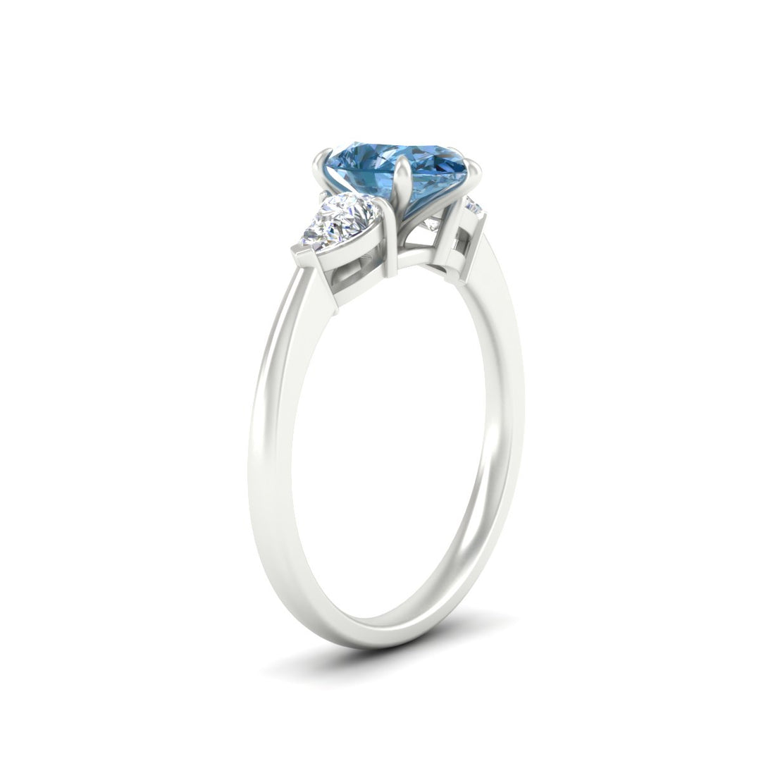 3-stone-vivid-blue-pear-shaped-cathedral-ring-in-white-gold-fdenr9210pegvblueangle2-nl-wg.jpg