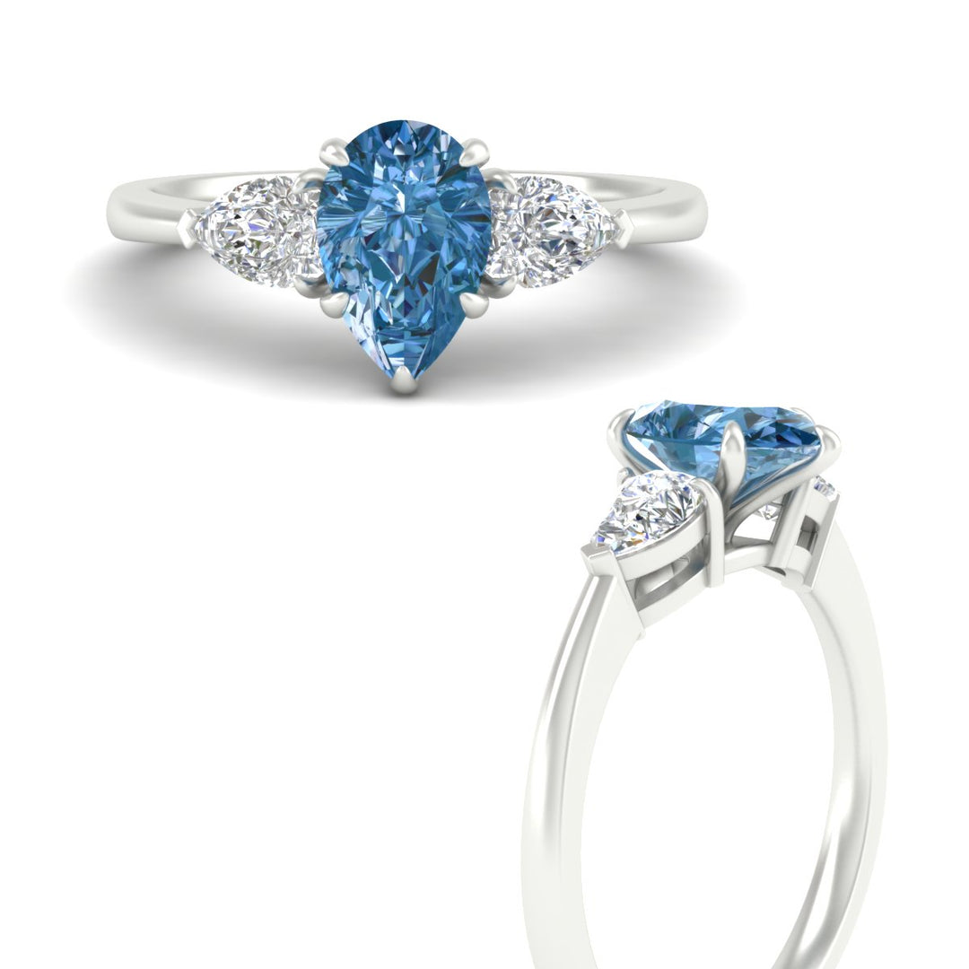 3-stone-vivid-blue-pear-shaped-cathedral-ring-in-white-gold-fdenr9210pegvblueangle3-nl-wg.jpg
