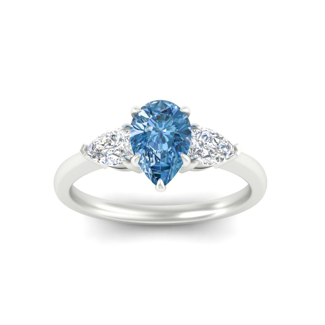3-stone-vivid-blue-pear-shaped-cathedral-ring-in-white-gold-fdenr9210pegvblueangle5-nl-wg.jpg