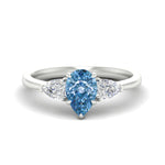 Load image into Gallery viewer, 3-stone-vivid-blue-pear-shaped-cathedral-ring-in-white-gold-fdenr9210pegvbluesleep-nl-wg.jpg