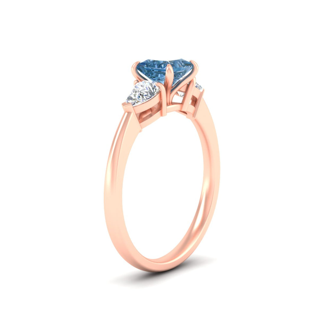 3-stone-vivid-blue-princess-cut-cathedral-ring-in-rose-gold-fdenr9210prgvblueangle2-nl-rg.jpg