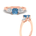 Load image into Gallery viewer, 3-stone-vivid-blue-princess-cut-cathedral-ring-in-rose-gold-fdenr9210prgvblueangle3-nl-rg.jpg