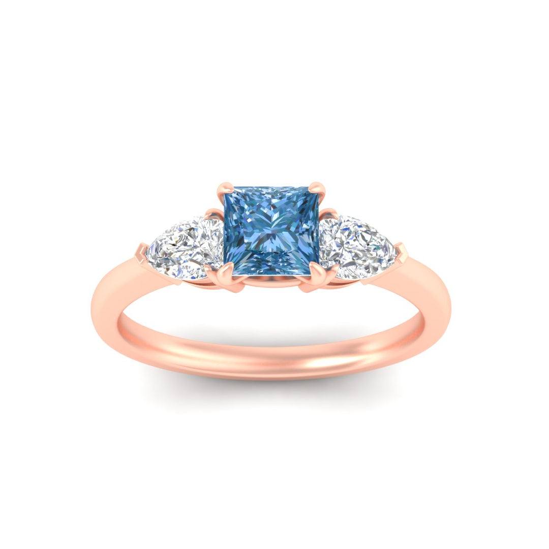 3-stone-vivid-blue-princess-cut-cathedral-ring-in-rose-gold-fdenr9210prgvblueangle5-nl-rg.jpg