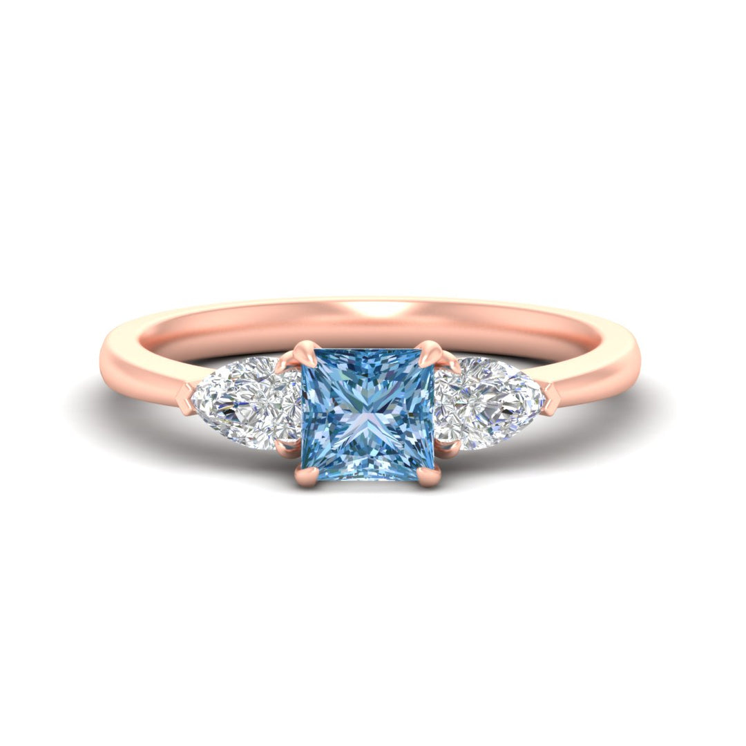 3-stone-vivid-blue-princess-cut-cathedral-ring-in-rose-gold-fdenr9210prgvbluesleep-nl-rg.jpg