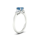 Load image into Gallery viewer, 3-stone-vivid-blue-princess-cut-cathedral-ring-in-white-gold-fdenr9210prgvblueangle2-nl-wg.jpg