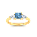 Load image into Gallery viewer, 3-stone-vivid-blue-princess-cut-cathedral-ring-in-yellow-gold-fdenr9210prgvblueangle5-nl-yg.jpg