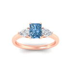 Load image into Gallery viewer, 3-stone-vivid-blue-radiant-cut-cathedral-ring-in-rose-gold-fdenr9210ragvblueangle5-nl-rg.jpg