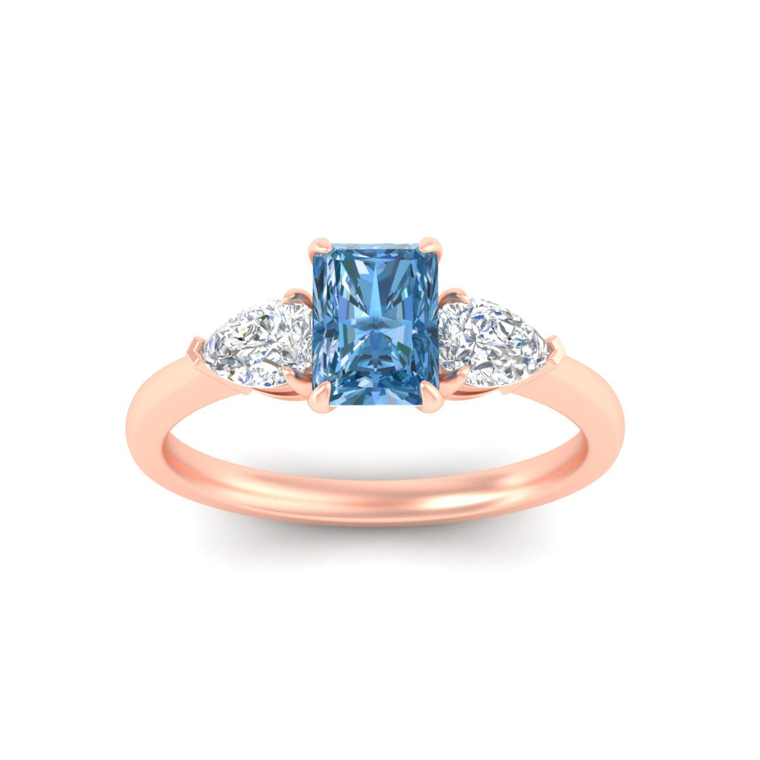 3-stone-vivid-blue-radiant-cut-cathedral-ring-in-rose-gold-fdenr9210ragvblueangle5-nl-rg.jpg