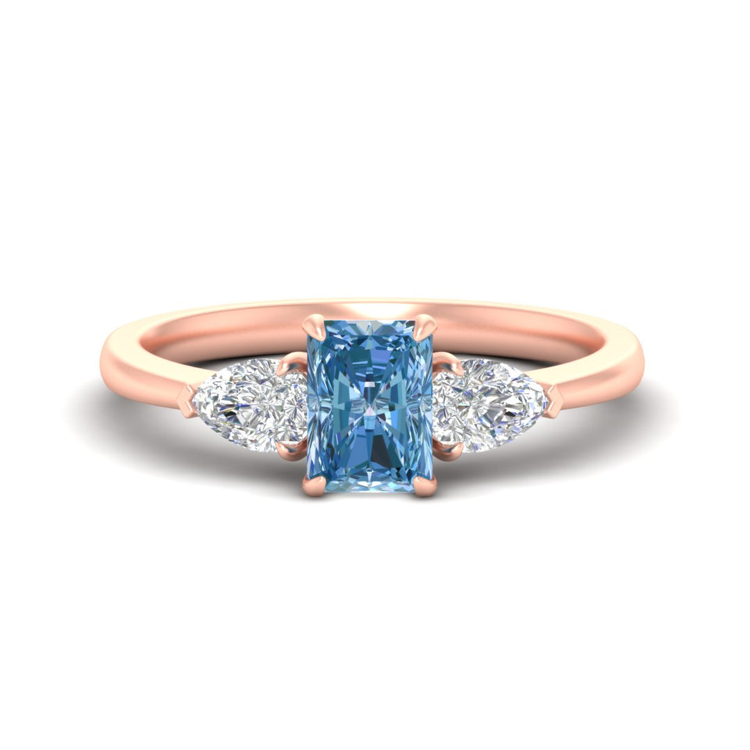 3-stone-vivid-blue-radiant-cut-cathedral-ring-in-rose-gold-fdenr9210ragvbluesleep-nl-rg.jpg