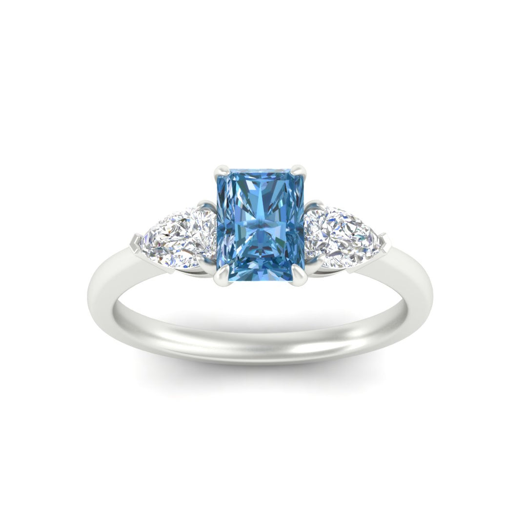 3-stone-vivid-blue-radiant-cut-cathedral-ring-in-white-gold-fdenr9210ragvblueangle5-nl-wg.jpg