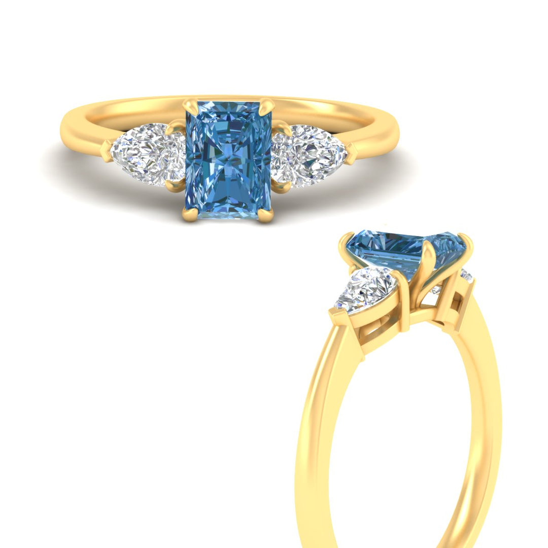3-stone-vivid-blue-radiant-cut-cathedral-ring-in-yellow-gold-fdenr9210ragvblueangle3-nl-yg.jpg