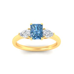 Load image into Gallery viewer, 3-stone-vivid-blue-radiant-cut-cathedral-ring-in-yellow-gold-fdenr9210ragvblueangle5-nl-yg.jpg