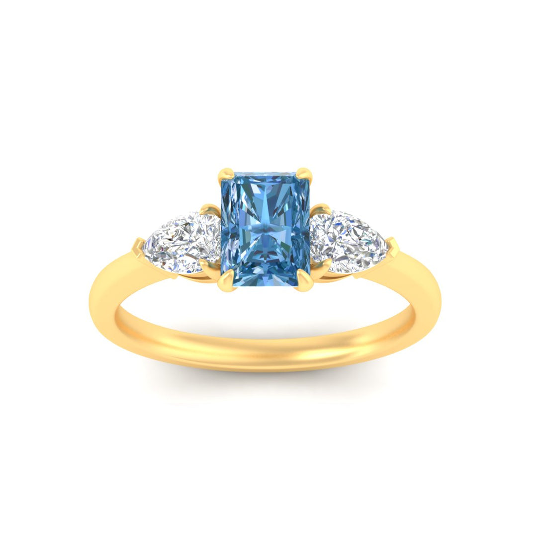 3-stone-vivid-blue-radiant-cut-cathedral-ring-in-yellow-gold-fdenr9210ragvblueangle5-nl-yg.jpg