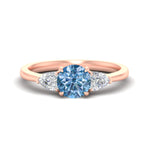Load image into Gallery viewer, 3-stone-vivid-blue-round-cut-cathedral-ring-in-rose-gold-fdenr9210rogvbluesleep-nl-rg.jpg