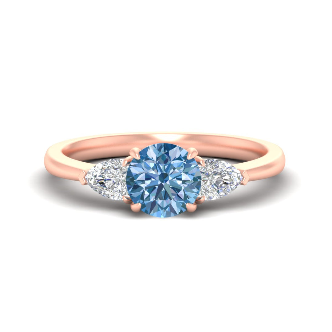 3-stone-vivid-blue-round-cut-cathedral-ring-in-rose-gold-fdenr9210rogvbluesleep-nl-rg.jpg