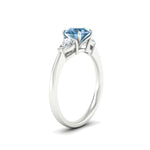 Load image into Gallery viewer, 3-stone-vivid-blue-round-cut-cathedral-ring-in-white-gold-fdenr9210rogvblueangle2-nl-wg.jpg
