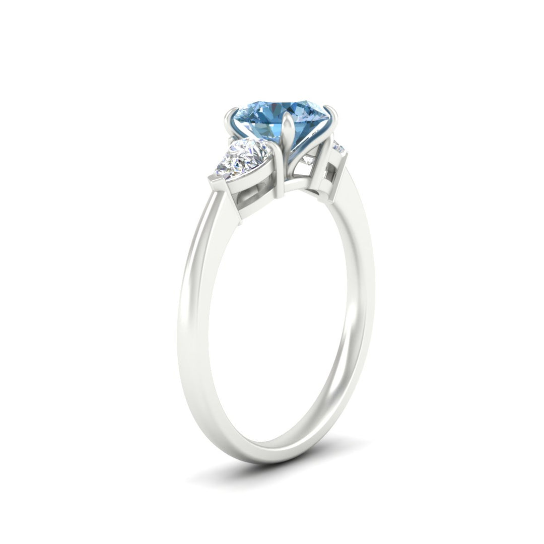 3-stone-vivid-blue-round-cut-cathedral-ring-in-white-gold-fdenr9210rogvblueangle2-nl-wg.jpg