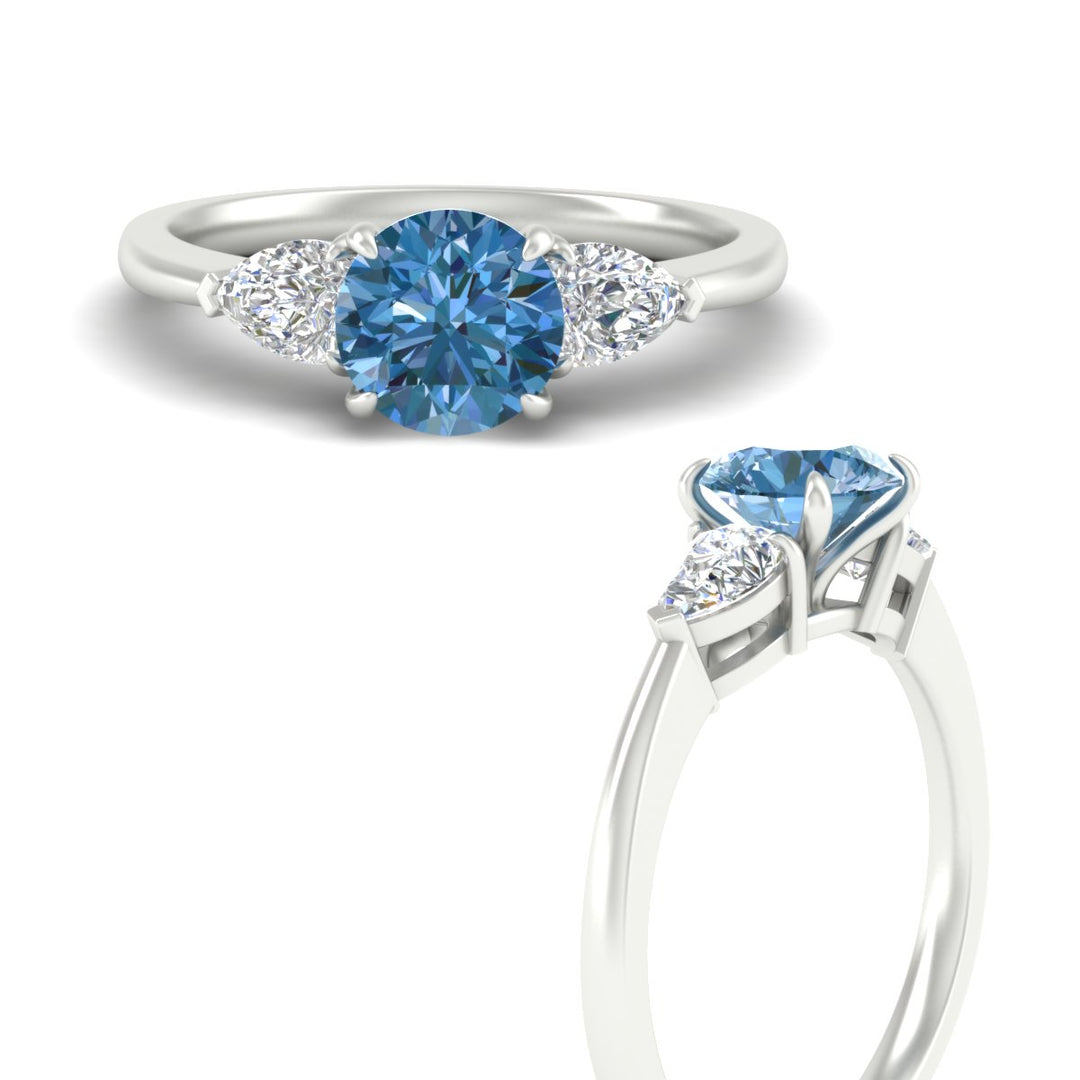 3-stone-vivid-blue-round-cut-cathedral-ring-in-white-gold-fdenr9210rogvblueangle3-nl-wg.jpg