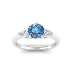 Load image into Gallery viewer, 3-stone-vivid-blue-round-cut-cathedral-ring-in-white-gold-fdenr9210rogvblueangle5-nl-wg.jpg