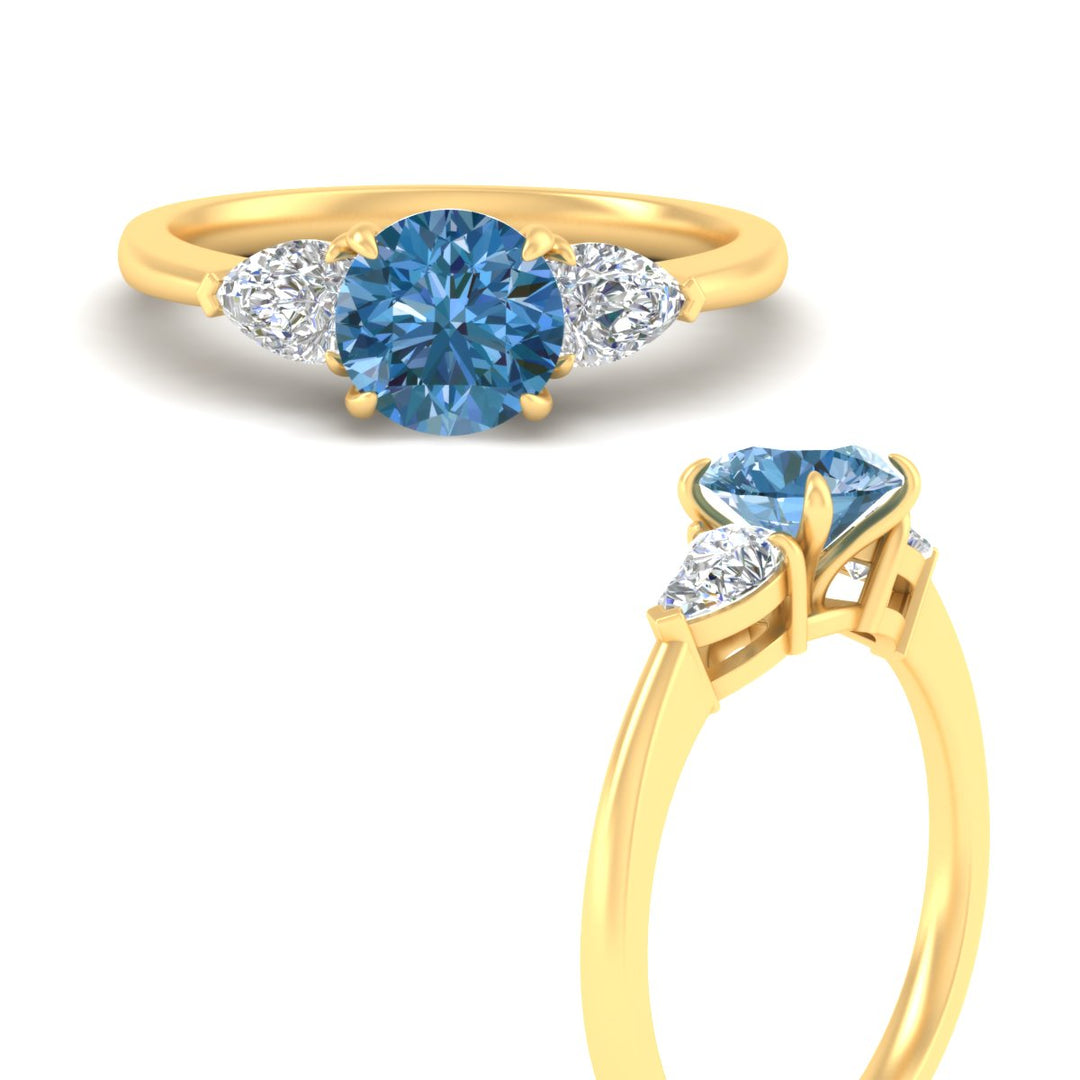 3-stone-vivid-blue-round-cut-cathedral-ring-in-yellow-gold-fdenr9210rogvblueangle3-nl-yg.jpg