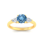 Load image into Gallery viewer, 3-stone-vivid-blue-round-cut-cathedral-ring-in-yellow-gold-fdenr9210rogvblueangle5-nl-yg.jpg
