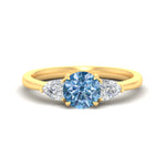 Load image into Gallery viewer, 3-stone-vivid-blue-round-cut-cathedral-ring-in-yellow-gold-fdenr9210rogvbluesleep-nl-yg.jpg