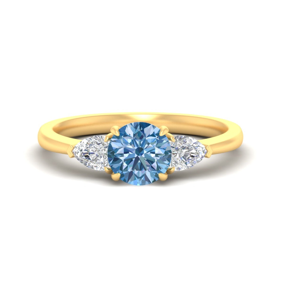 3-stone-vivid-blue-round-cut-cathedral-ring-in-yellow-gold-fdenr9210rogvbluesleep-nl-yg.jpg