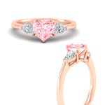 Load image into Gallery viewer, 3-stone-vivid-pink-heart-shaped-cathedral-ring-in-rose-gold-fdenr9210htgvpinkangle3-nl-rg.jpg