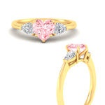 Load image into Gallery viewer, 3-stone-vivid-pink-heart-shaped-cathedral-ring-in-yellow-gold-fdenr9210htgvpinkangle3-nl-yg.jpg