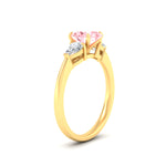 Load image into Gallery viewer, 3-stone-vivid-pink-oval-shaped-cathedral-ring-in-yellow-gold-fdenr9210ovgvpinkangle2-nl-yg.jpg