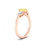 Load image into Gallery viewer, 3-stone-vivid-yellow-heart-shaped-cathedral-ring-in-rose-gold-fdenr9210htgvyellowangle2-nl-rg.jpg