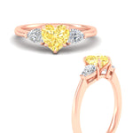 Load image into Gallery viewer, 3-stone-vivid-yellow-heart-shaped-cathedral-ring-in-rose-gold-fdenr9210htgvyellowangle3-nl-rg.jpg
