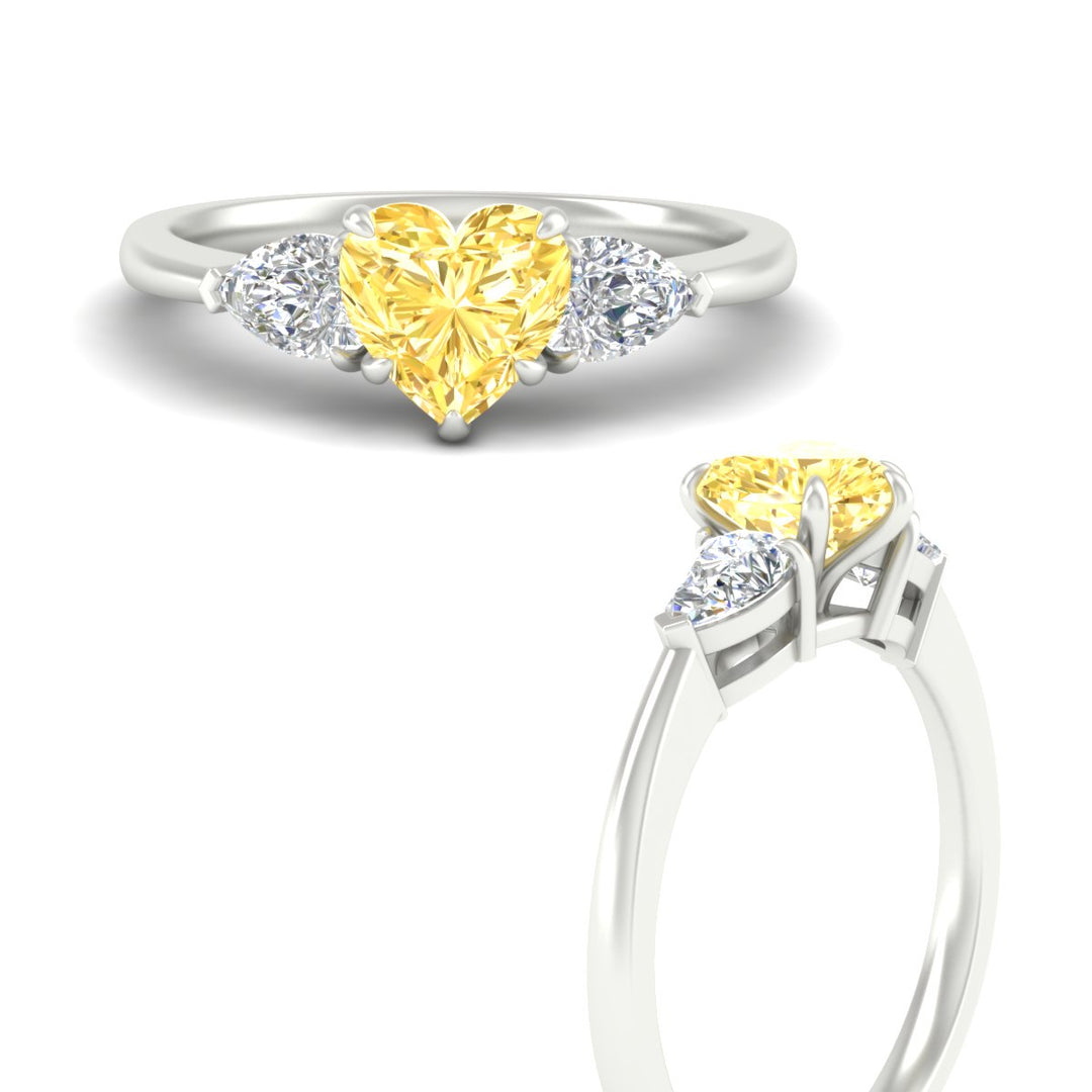 3-stone-vivid-yellow-heart-shaped-cathedral-ring-in-white-gold-fdenr9210htgvyellowangle3-nl-wg.jpg