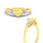 Load image into Gallery viewer, 3-stone-vivid-yellow-heart-shaped-cathedral-ring-in-yellow-gold-fdenr9210htgvyellowangle3-nl-yg.jpg
