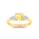 Load image into Gallery viewer, 3-stone-vivid-yellow-heart-shaped-cathedral-ring-in-yellow-gold-fdenr9210htgvyellowangle5-nl-yg.jpg