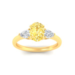 Load image into Gallery viewer, 3-stone-vivid-yellow-oval-shaped-cathedral-ring-in-yellow-gold-fdenr9210ovgvyellowangle5-nl-yg.jpg