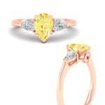Load image into Gallery viewer, 3-stone-vivid-yellow-pear-shaped-cathedral-ring-in-rose-gold-fdenr9210pegvyellowangle3-nl-rg.jpg