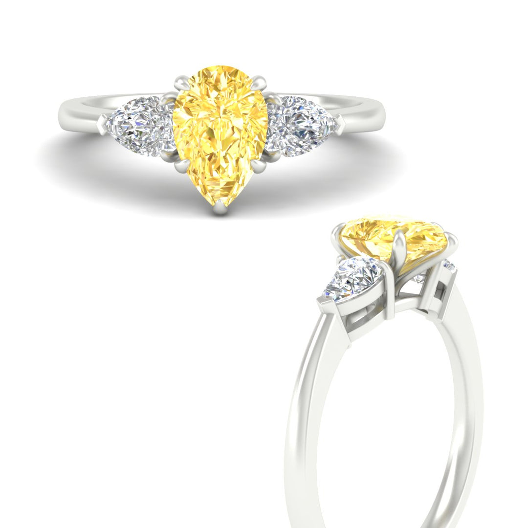 3-stone-vivid-yellow-pear-shaped-cathedral-ring-in-white-gold-fdenr9210pegvyellowangle3-nl-wg.jpg