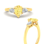 Load image into Gallery viewer, 3-stone-vivid-yellow-pear-shaped-cathedral-ring-in-yellow-gold-fdenr9210pegvyellowangle3-nl-yg.jpg