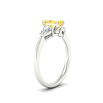 Load image into Gallery viewer, 3-stone-vivid-yellow-radiant-cut-cathedral-ring-in-white-gold-fdenr9210ragvyellowangle2-nl-wg.jpg