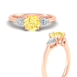 Load image into Gallery viewer, 3-stone-vivid-yellow-round-cut-cathedral-ring-in-rose-gold-fdenr9210rogvyellowangle3-nl-rg.jpg