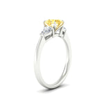 Load image into Gallery viewer, 3-stone-vivid-yellow-round-cut-cathedral-ring-in-white-gold-fdenr9210rogvyellowangle2-nl-wg.jpg