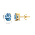 Load image into Gallery viewer, 4-carat-oval-cut-vivid-blue-diamond-stud-earrings-in-yellow-gold-fdear10411ovgvblueangle2-4.00ct-nl-yg-hw.jpg