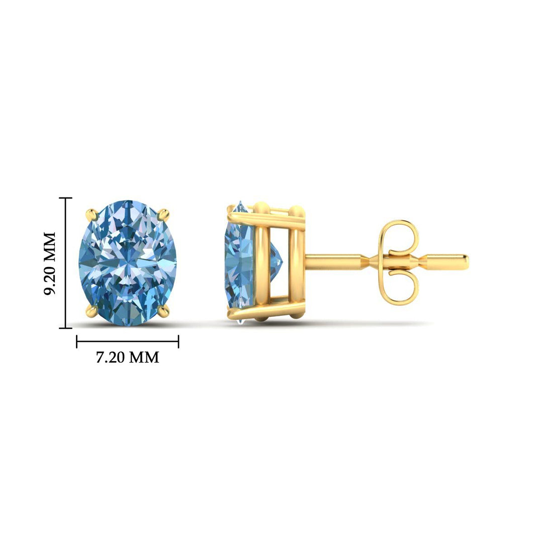 4-carat-oval-cut-vivid-blue-diamond-stud-earrings-in-yellow-gold-fdear10411ovgvblueangle2-4.00ct-nl-yg-hw.jpg